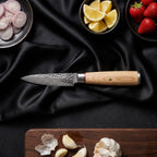 Kinari Paring Knife · on the cutting board