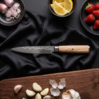 Kinari Petty Knife · on the cutting board
