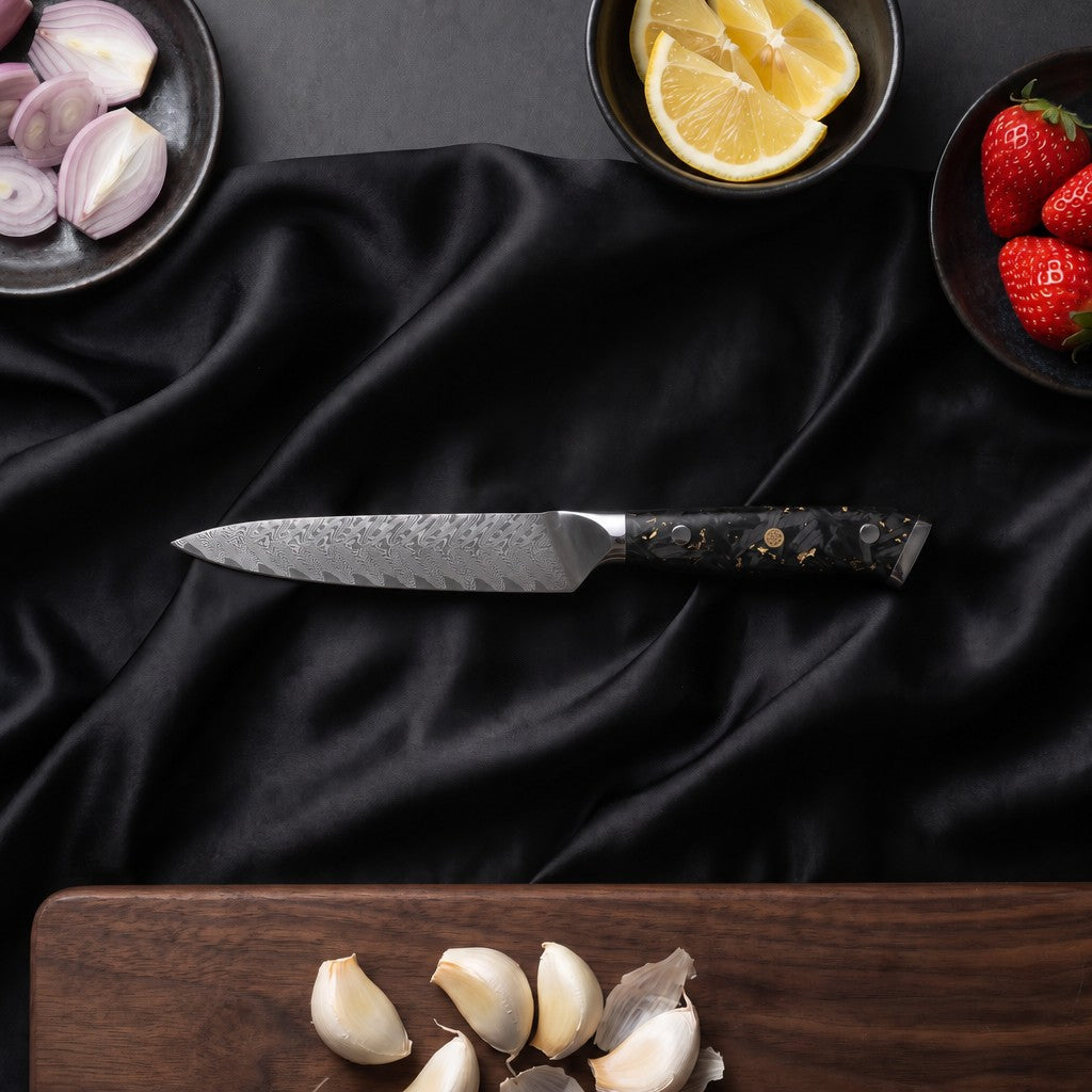 Kinpaku Knife Duo (Gyuto & Utility) · Utility Knife on the cutting board