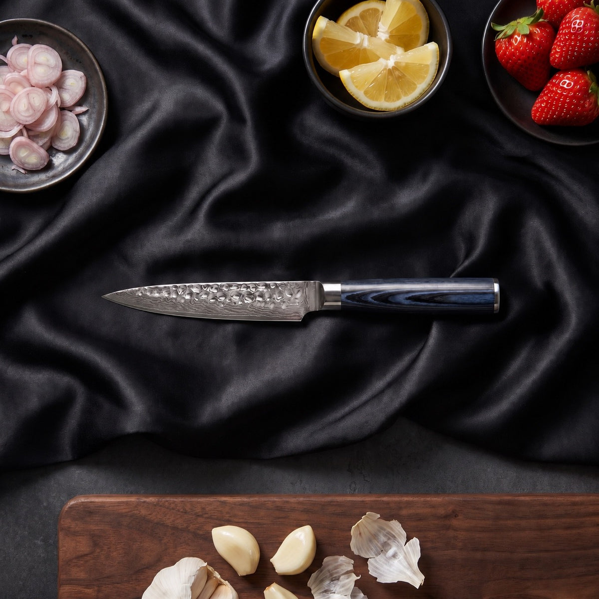Konpeki 5-Piece Knife Set · Utility Knife on the cutting board