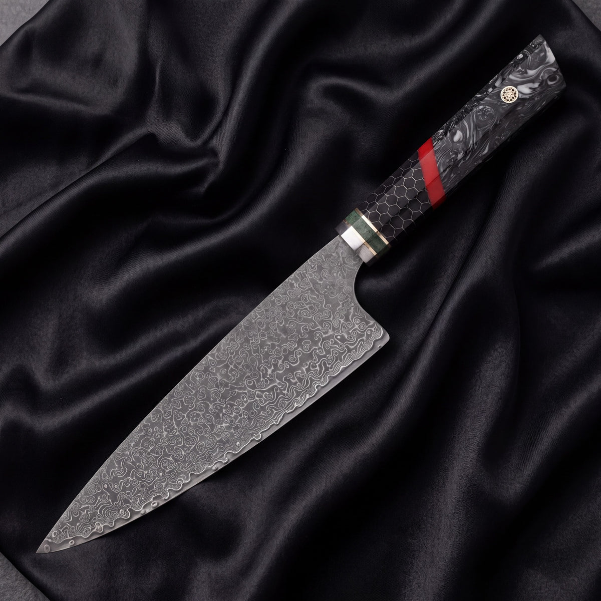 Hibana Broad Gyuto Chef Knife · full blade on black silk