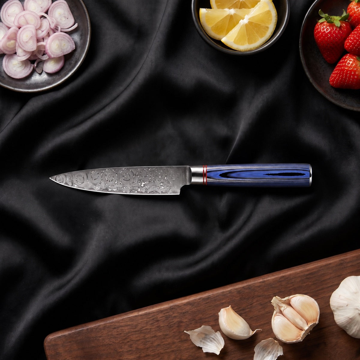 Aizome Knife Trio (Gyuto, Nakiri & Utility) · Utility Knife on the cutting board