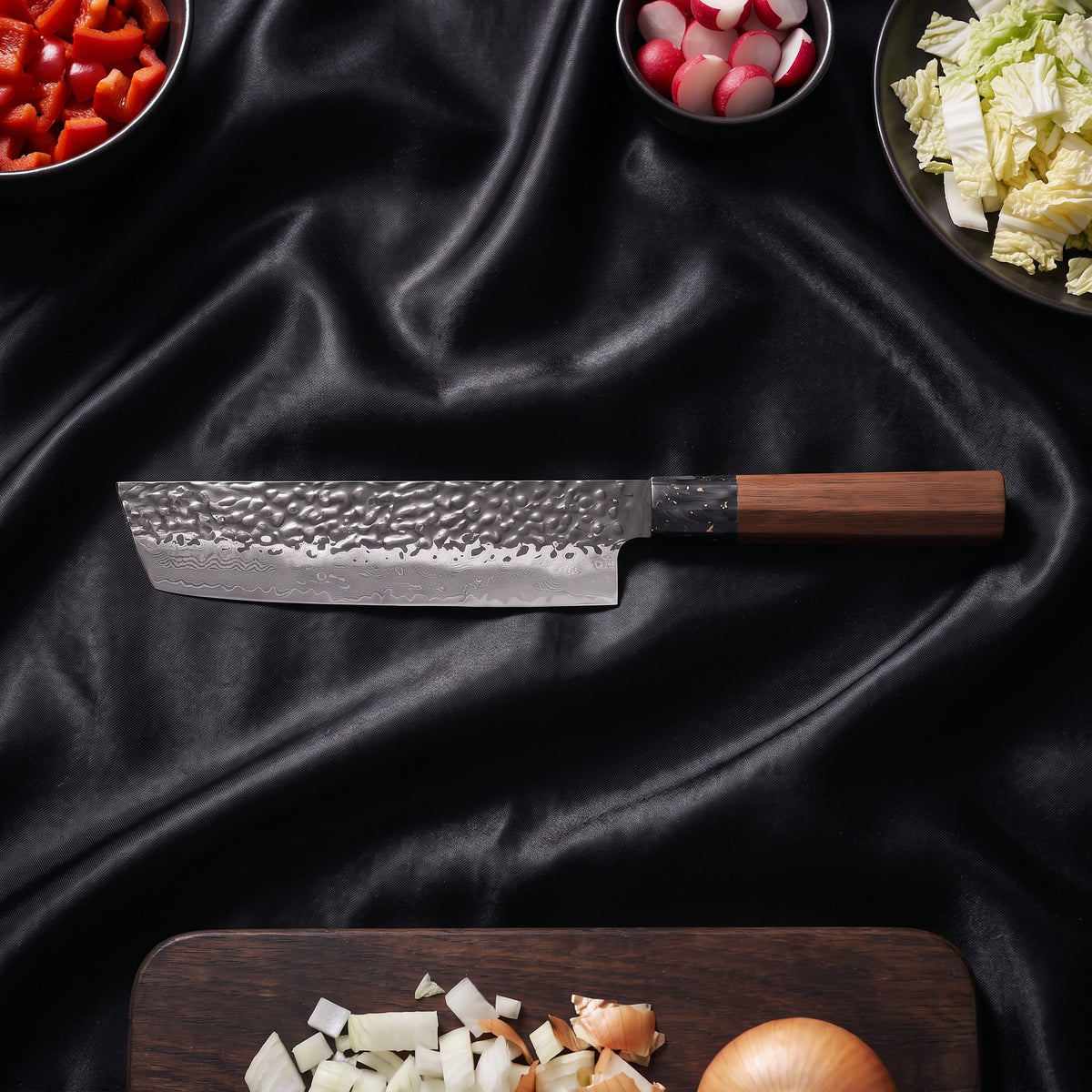 Kurumi 5-Piece Knife Set · Nakiri Vegetable Knife on the cutting board