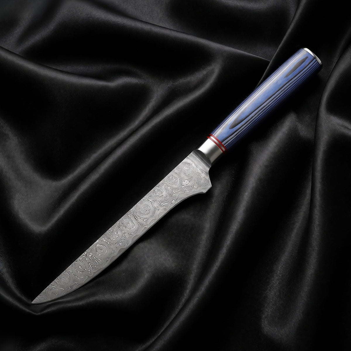 Aizome Honesuki Boning Knife · full blade on black silk