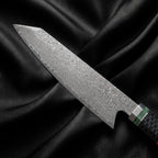 Enji Kiritsuke Chef-Slicer Knife · Damascus blade close-up