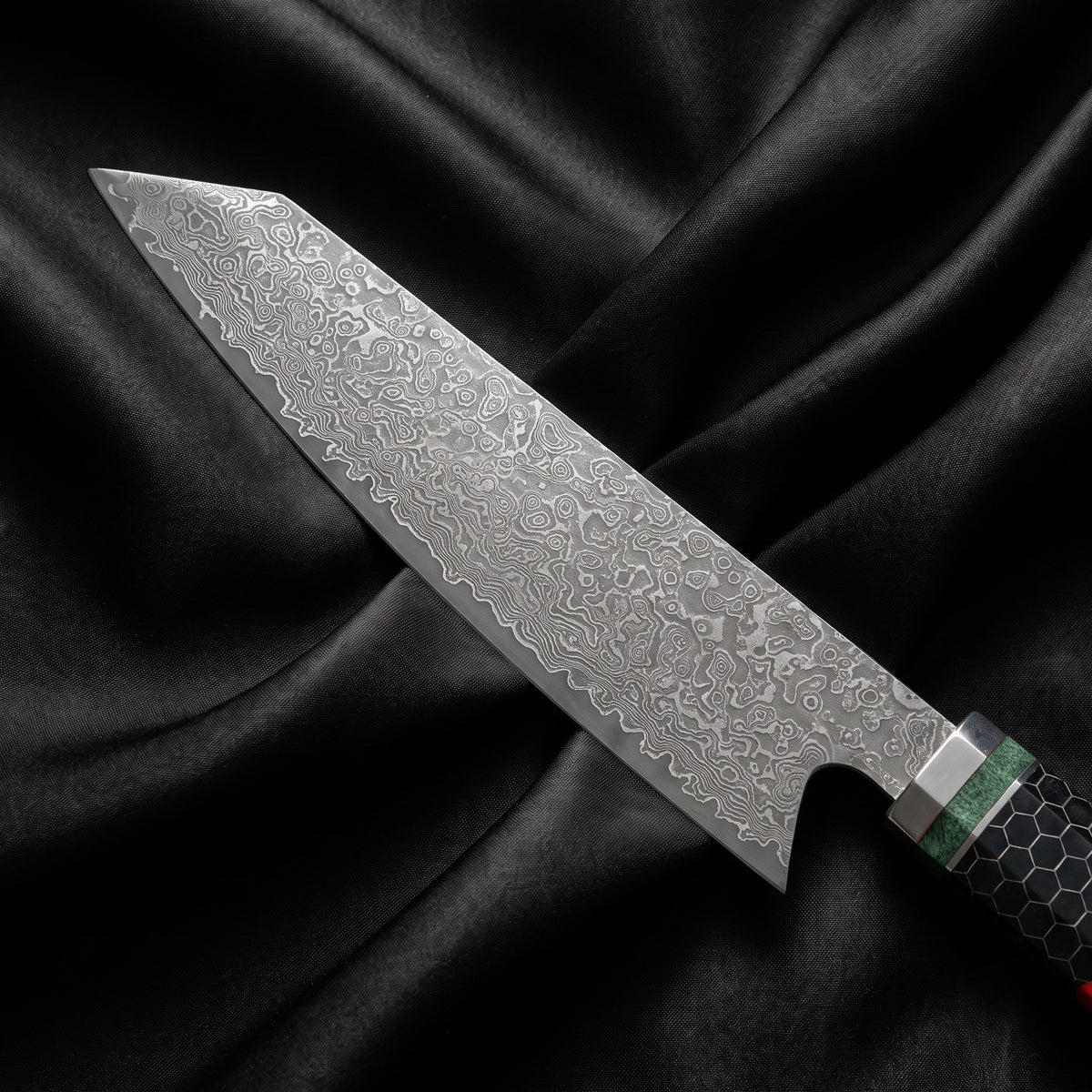 Enji Kiritsuke Chef-Slicer Knife · Damascus blade close-up