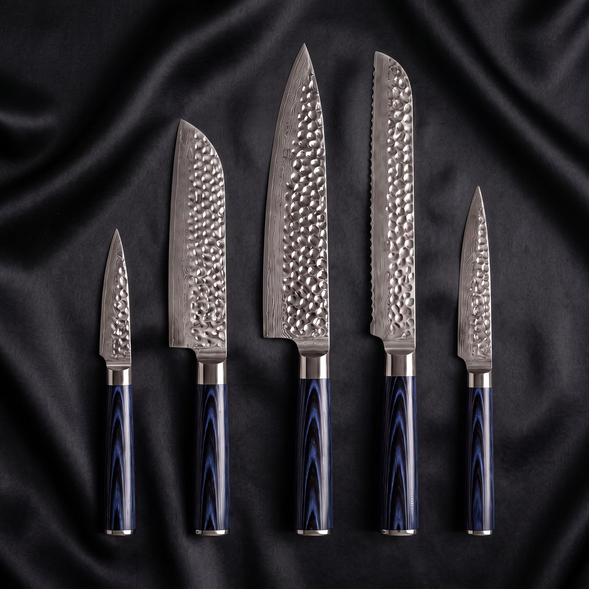 Konpeki 5-Piece Knife Set · the full set on black silk