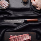 Tsubaki 3-Piece Knife Set · Kiritsuke Chef-Slicer Knife on the cutting board