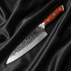 Kitae Gyuto Chef Knife · full blade on black silk