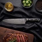 Kinpaku Knife Duo (Gyuto & Utility) · Gyuto Chef Knife on the cutting board