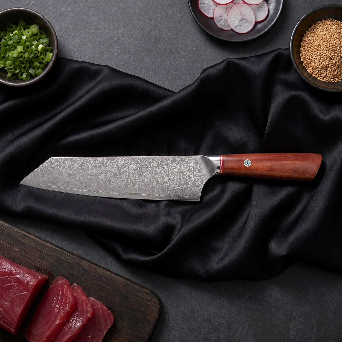 Kasane 7-Piece Knife Set · Kiritsuke Chef-Slicer Knife on the cutting board