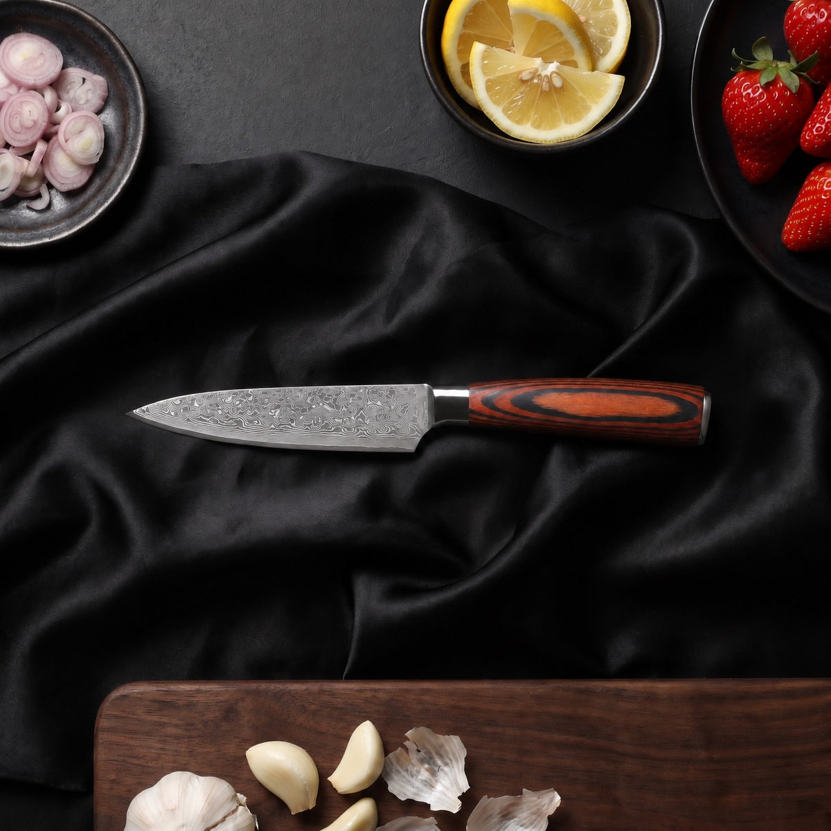 Yuhi Knife Trio (Gyuto, Nakiri & Petty) · Petty Knife on the cutting board