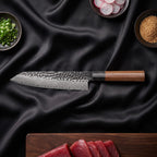 Kurumi 5-Piece Knife Set · Kiritsuke Chef-Slicer Knife on the cutting board