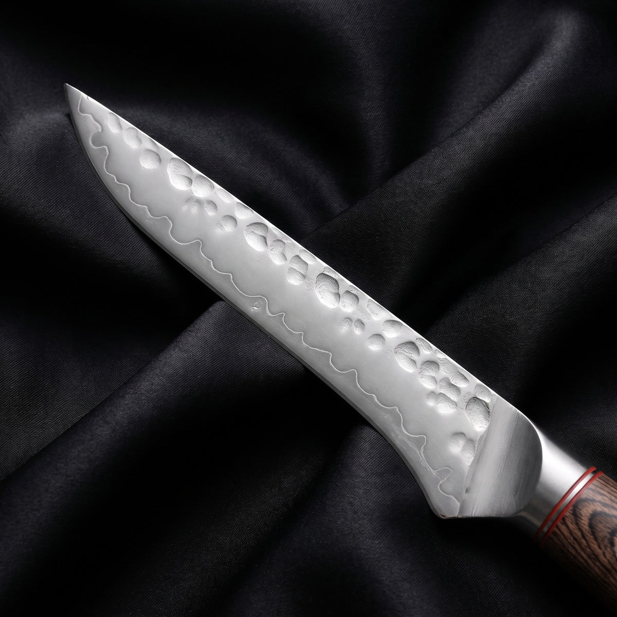 Daichi Honesuki Boning Knife · Damascus blade close-up