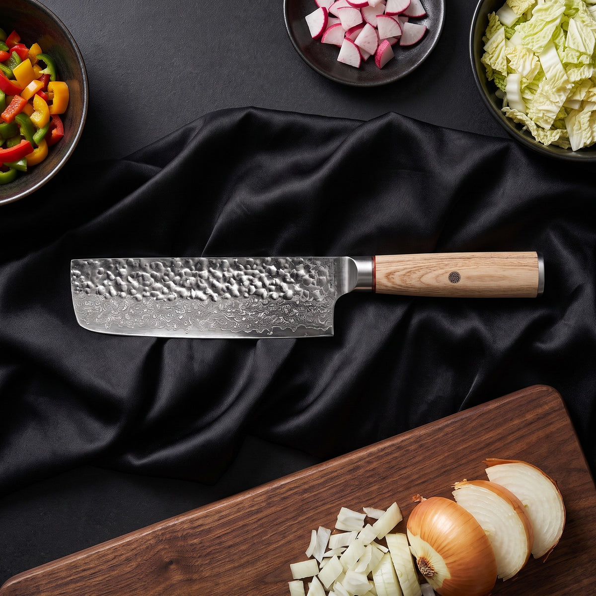 Kinari 7-Piece Knife Set · Nakiri Vegetable Knife on the cutting board