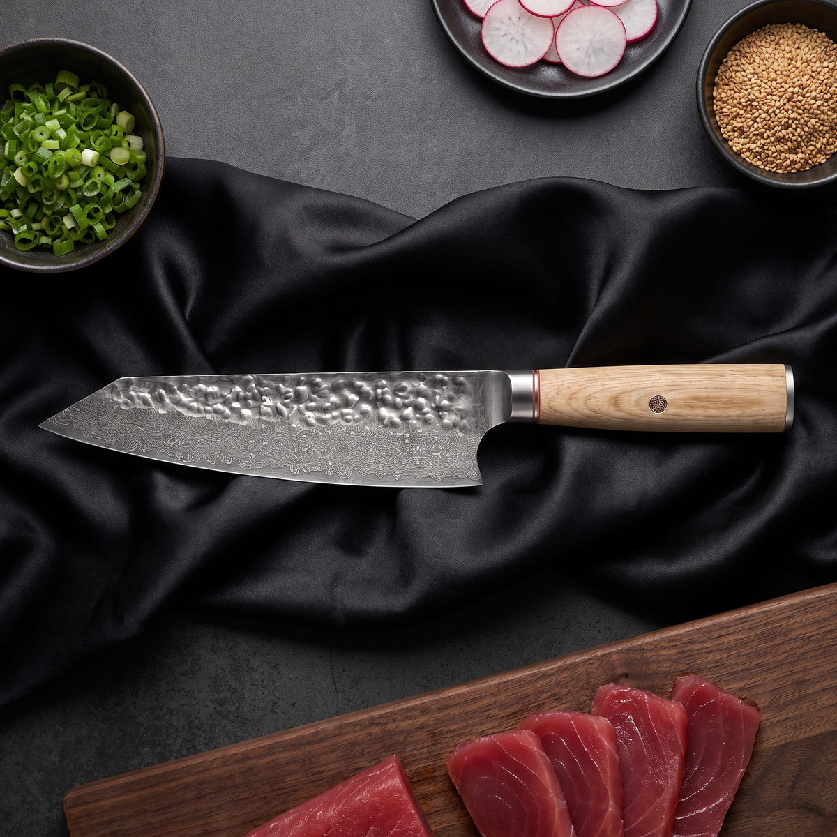 Kinari 7-Piece Knife Set · Kiritsuke Chef-Slicer Knife on the cutting board