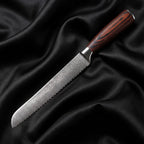 Yuhi Bread Knife · full blade on black silk