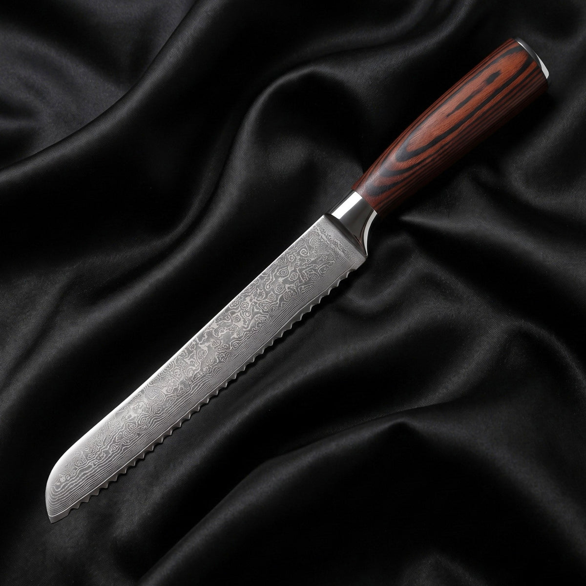 Yuhi Bread Knife · full blade on black silk