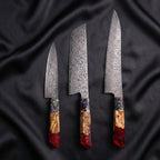 Saiun Knife Trio (Gyuto, Nakiri & Utility) · the full set on black silk