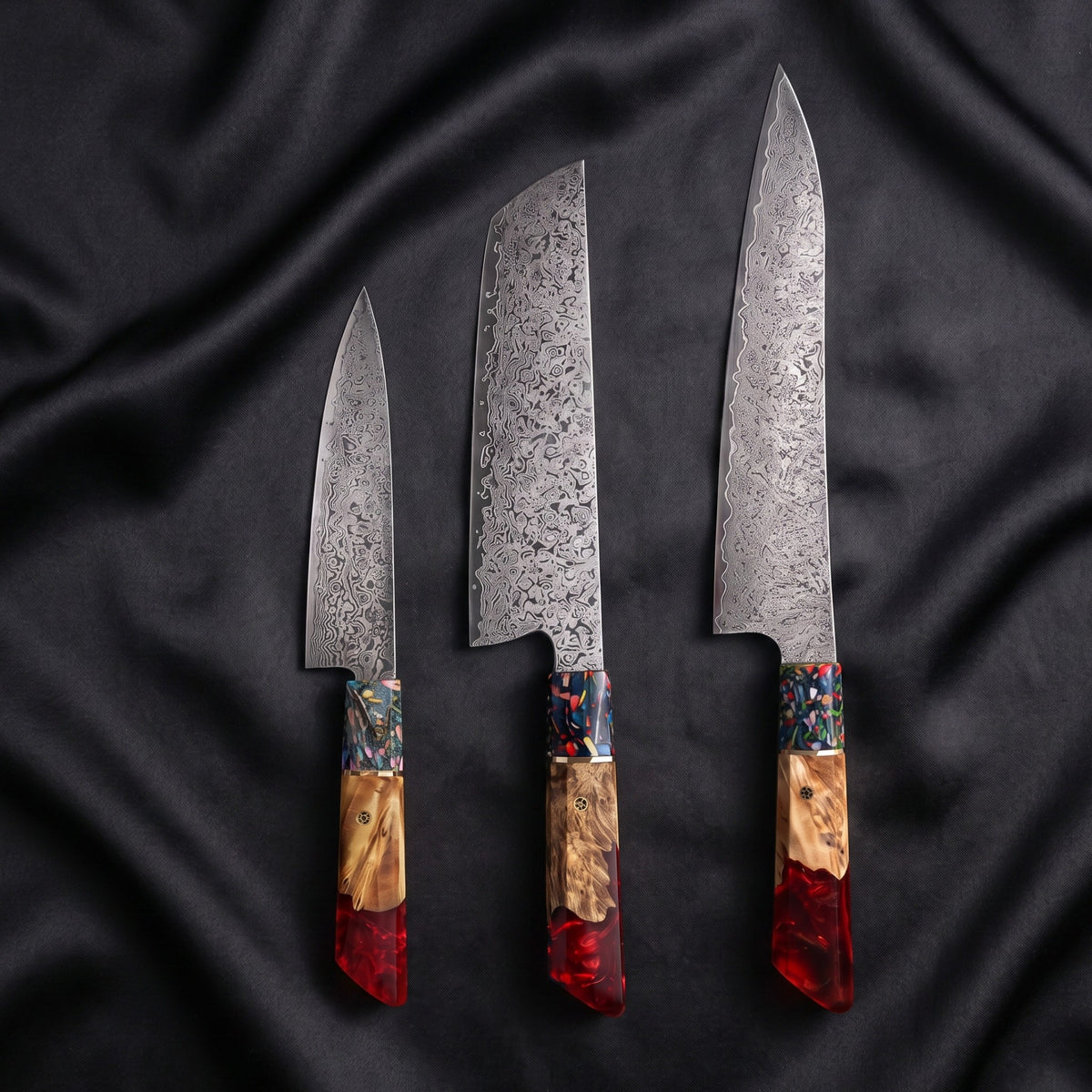 Saiun Knife Trio (Gyuto, Nakiri & Utility) · the full set on black silk