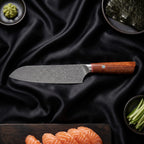 Kasane 7-Piece Knife Set · Santoku All-Purpose Knife on the cutting board