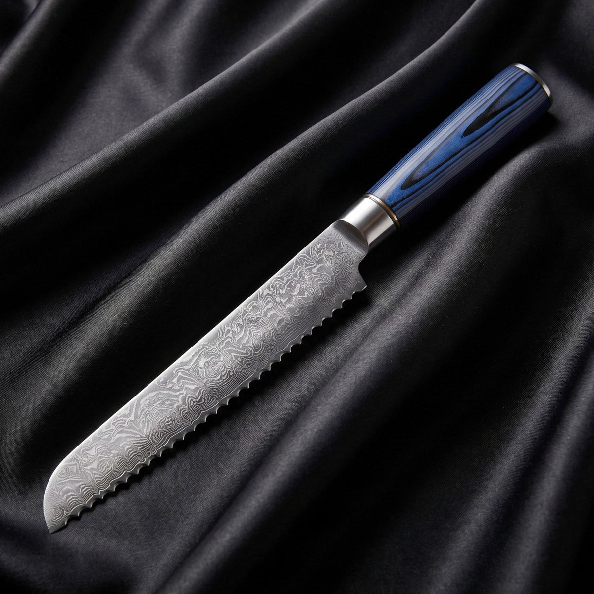 Aizome Bread Knife · full blade on black silk