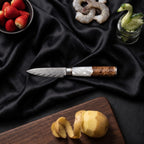 Shinju Paring Knife · on the cutting board