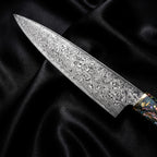 Saiun Utility Knife · Damascus blade close-up