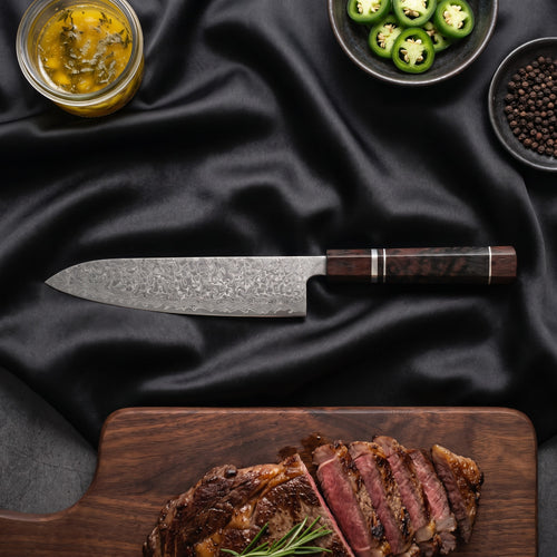 Ginrei Damascus Knife Set · Gyuto on the cutting board