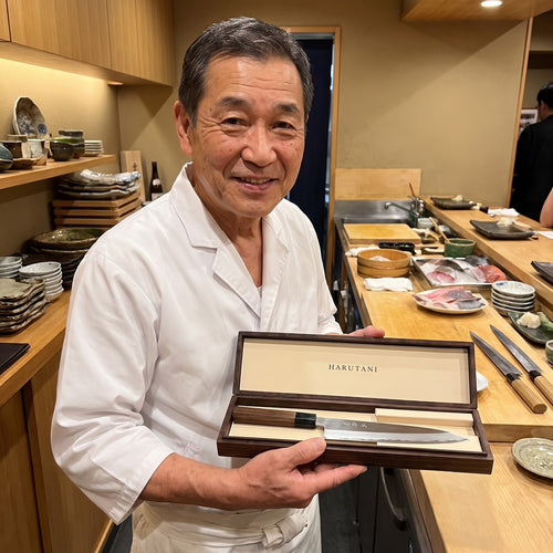 Sushi chef with HARUTANI knife box