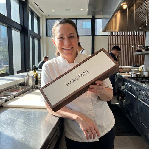 Chef holding HARUTANI box in a California kitchen