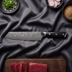 Homura Damascus Knife Set · Kiritsuke on the cutting board