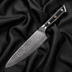 Homura Gyuto Chef Knife · full blade on black silk