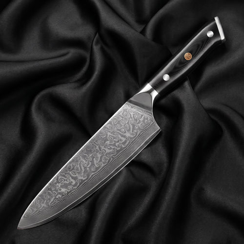 Homura Gyuto Chef Knife · full blade on black silk