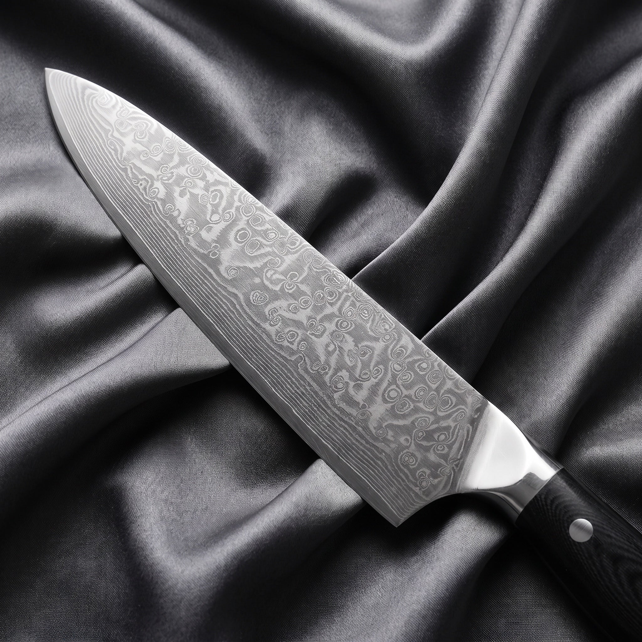 Homura Gyuto Chef Knife · Damascus blade close-up