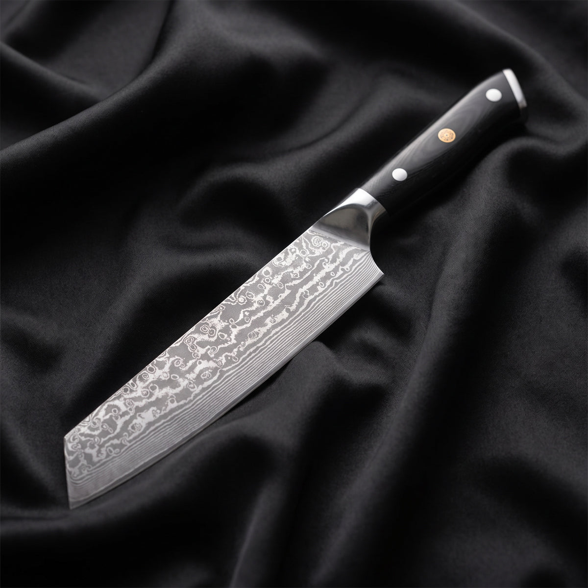 Homura Kiritsuke Chef Knife · full blade on black silk