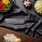 Homura Knife Trio (Gyuto, Nakiri & Petty) · Nakiri on the cutting board