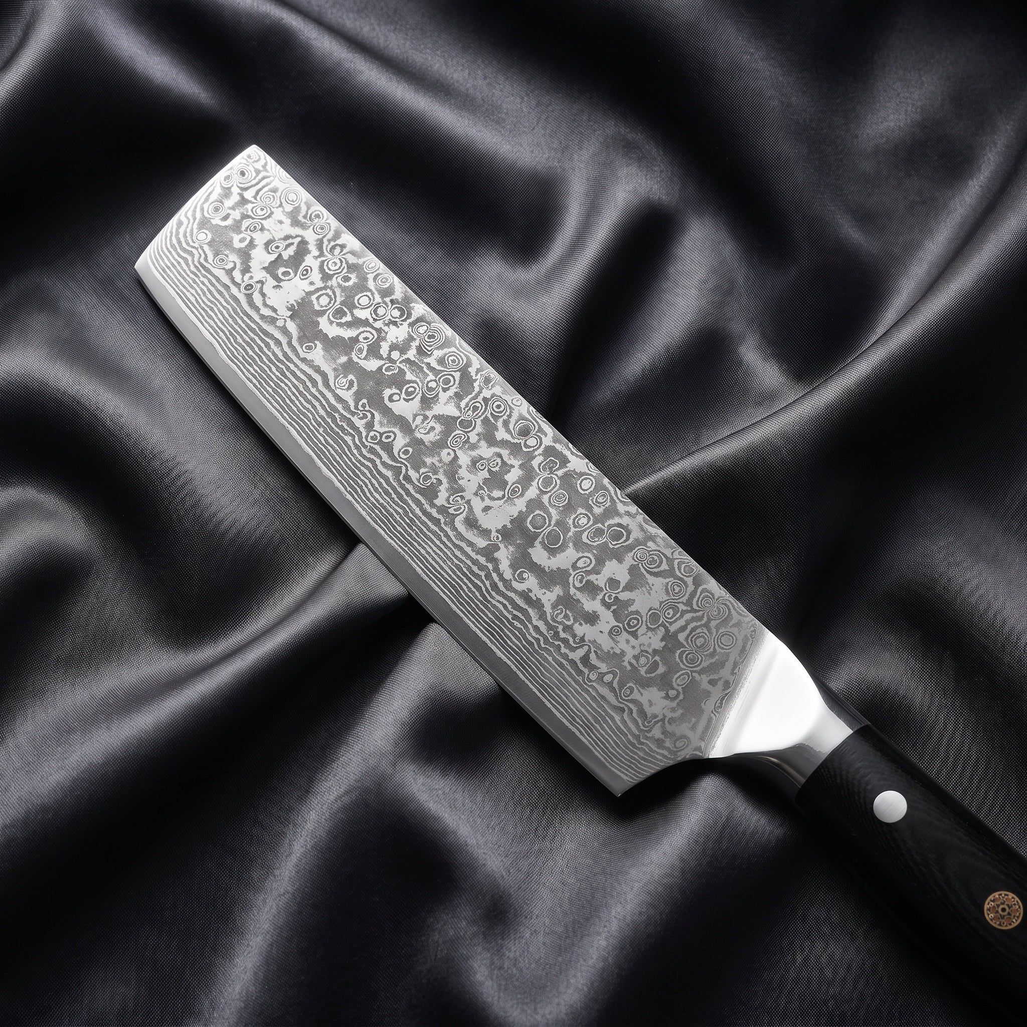 Homura Nakiri Knife · Damascus blade close-up