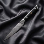 Homura Petty Utility Knife · full blade on black silk