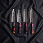 Hotaru Damascus Knife Set · the full set on black silk