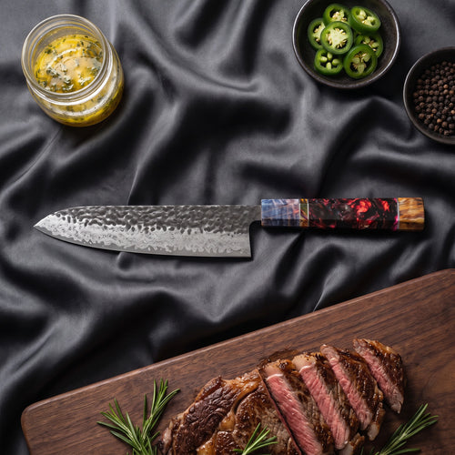 Hotaru Knife Duo (Gyuto & Nakiri) · Gyuto on the cutting board