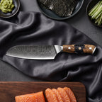 Hyoga Santoku Knife · on the cutting board