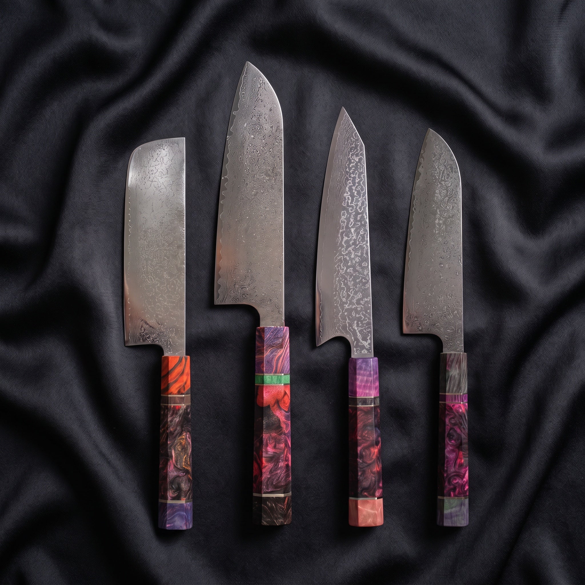 Kasumi Damascus Knife Set · the full set on black silk