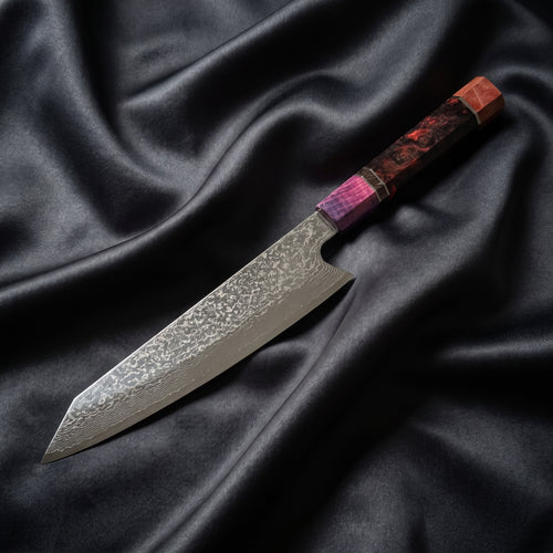 Kasumi Kiritsuke Chef Knife · full blade on black silk