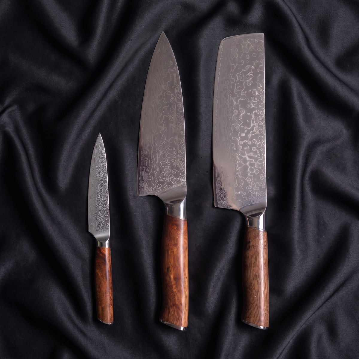 Komorebi Knife Trio (Gyuto, Nakiri & Petty) · the full set on black silk