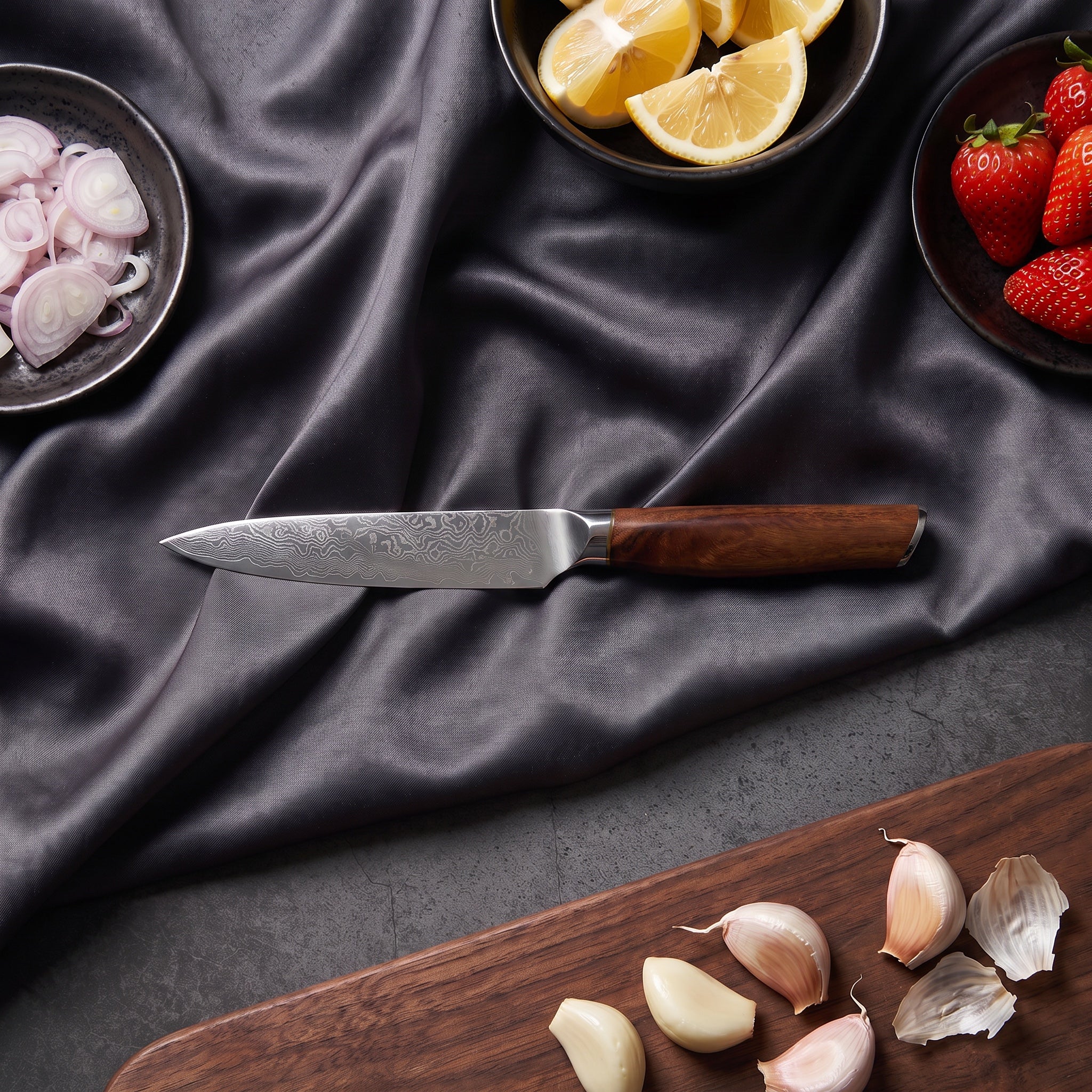 Komorebi Petty Utility Knife · on the cutting board