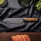 Konoha Santoku All-Purpose Knife · on the cutting board