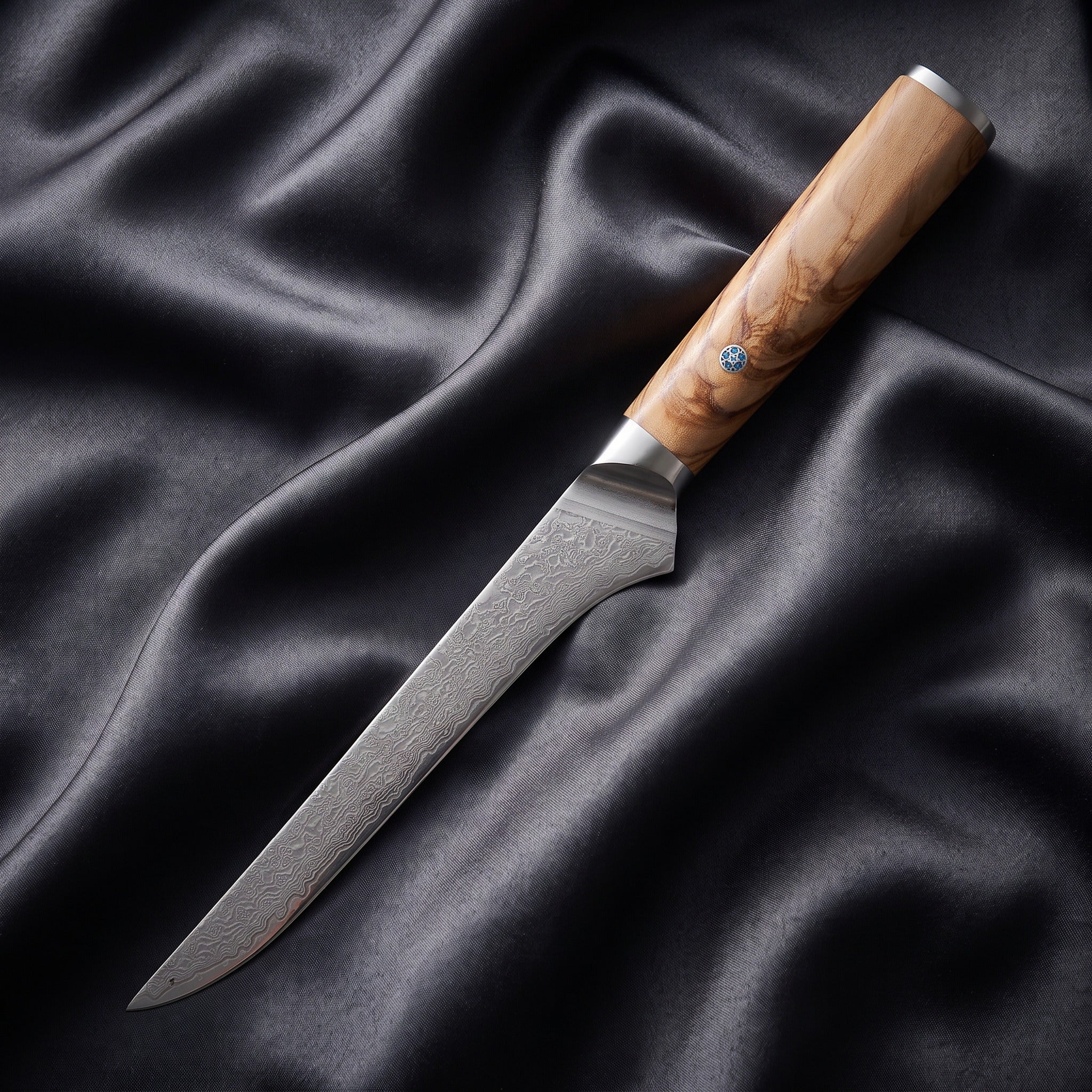 Nishiki Honesuki Boning Knife · full blade on black silk