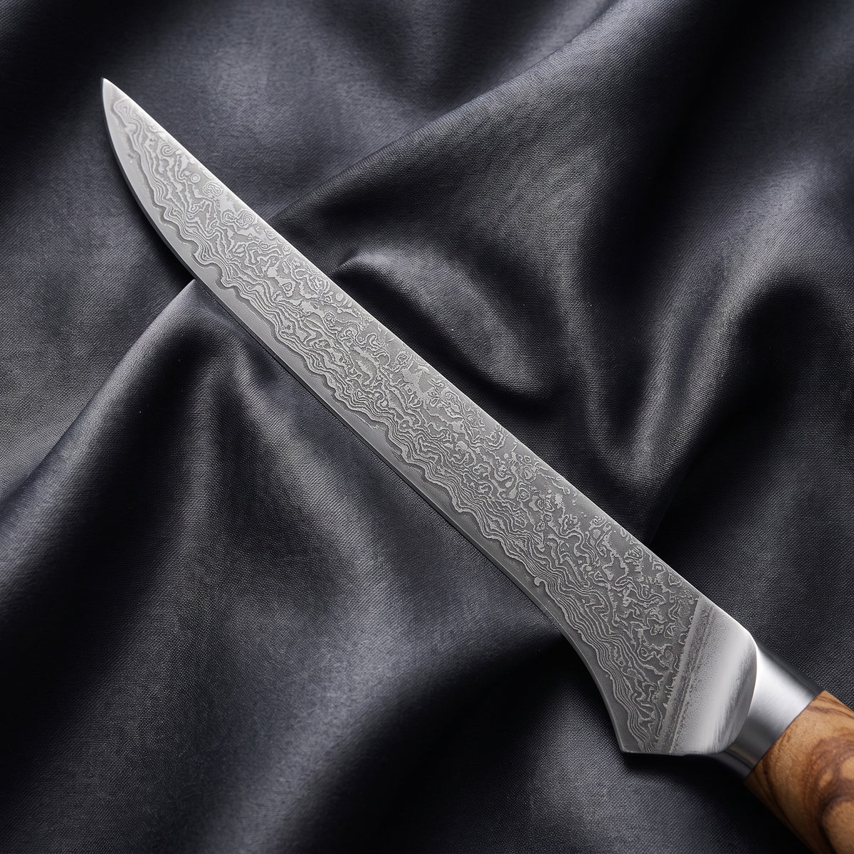 Nishiki Honesuki Boning Knife · Damascus blade close-up