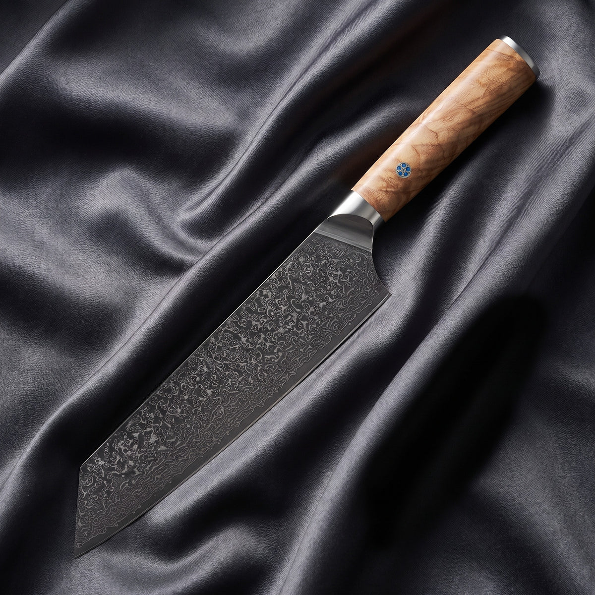 Nishiki Kiritsuke Chef Knife · full blade on black silk
